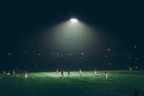 How can football clubs promote mental health awareness and support among players?